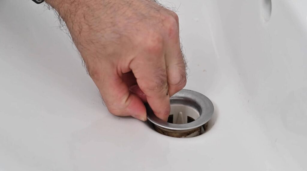 retirer vieille bonde de lavabo par le dessus