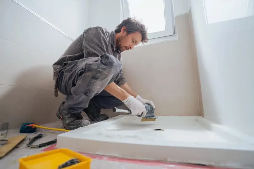 comment coller un receveur de douche en résine
