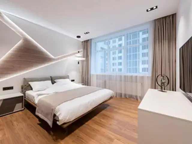 télévision sur un meuble dans une chambre design